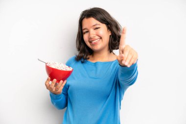 hispanic pretty girl feeling stressed, anxious, tired and frustrated. breakfast concept
