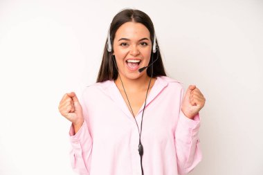 hispanic pretty woma on profile view thinking, imagining or daydreaming. telemarketer concept