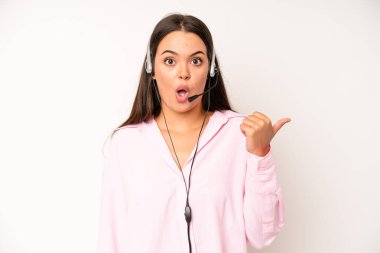 hispanic pretty woma feeling puzzled and confused and doubting. telemarketer concept