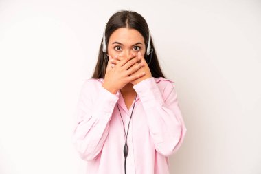 hispanic pretty woma feeling confused and puzzled, showing you are insane. telemarketer concept