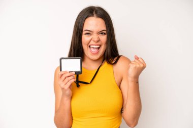 hispanic pretty woma on profile view thinking, imagining or daydreaming. vip pass id card concept