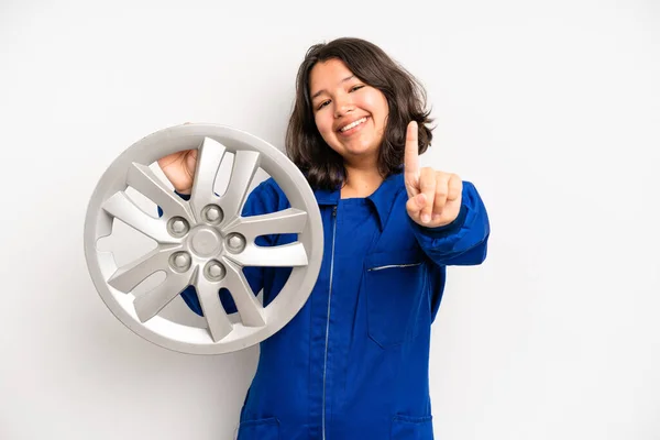 Hispanic Pretty Girl Shrugging Feeling Confused Uncertain Car Mechanic Employee — Stock Fotó