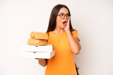 hispanic pretty woma feeling stressed, anxious, tired and frustrated. delivery take away concept