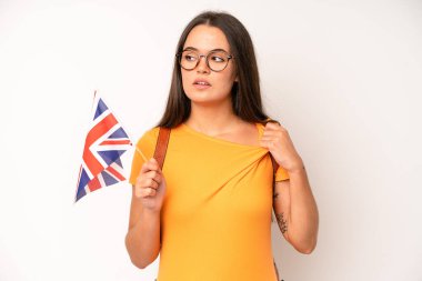 hispanic pretty woma feeling happy, surprised realizing a solution or idea. england flag concept