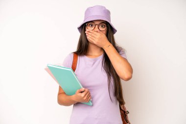 hispanic pretty woma feeling confused and puzzled, showing you are insane. university student concept