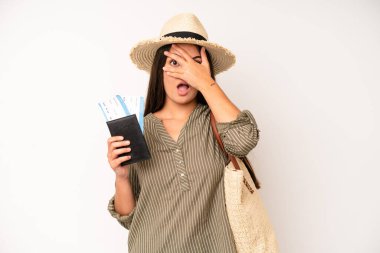 hispanic pretty woma looking unhappy and stressed, suicide gesture making gun sign. travel and summer concept