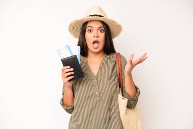 hispanic pretty woma smiling with a happy, confident expression with hand on chin. travel and summer concept
