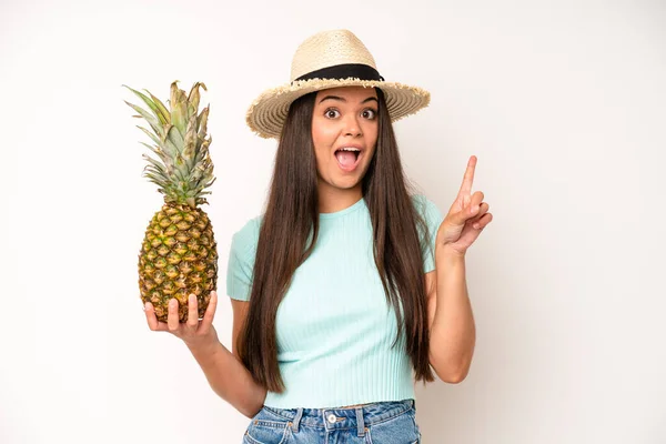Hispanic Pretty Woma Smiling Looking Friendly Showing Number One Pineapple — Foto de Stock