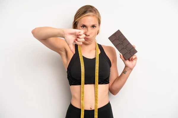 Pretty Caucasian Woman Feeling Cross Showing Thumbs Chocolate Fitness Concept — Stock Photo, Image