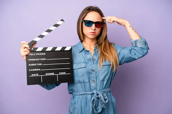 Pretty Caucasian Woman Feeling Confused Puzzled Showing You Insane Film — Stock Photo, Image