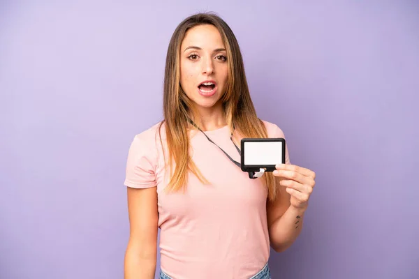 Pretty Caucasian Woman Looking Very Shocked Surprised Vip Pass Card — Fotografia de Stock