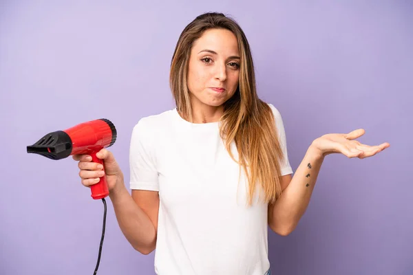Pretty Caucasian Woman Feeling Puzzled Confused Doubting Hair Dryer Concept — Foto de Stock