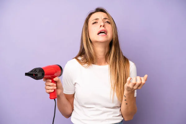 Pretty Caucasian Woman Looking Desperate Frustrated Stressed Hair Dryer Concept — Stockfoto