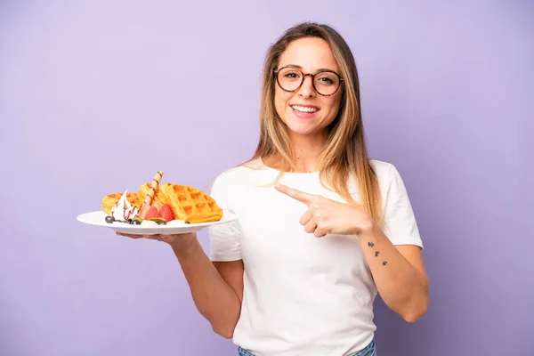 Pretty Caucasian Woman Smiling Cheerfully Feeling Happy Pointing Side Waffles —  Fotos de Stock