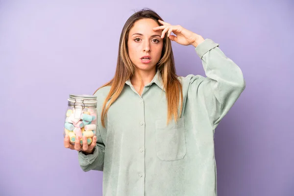 Pretty Caucasian Woman Looking Happy Astonished Surprised Candies Bottle Concept — Stockfoto