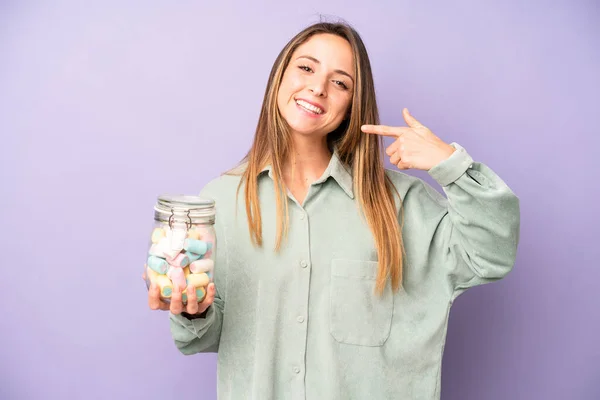 Pretty Caucasian Woman Smiling Confidently Pointing Own Broad Smile Candies — Stockfoto