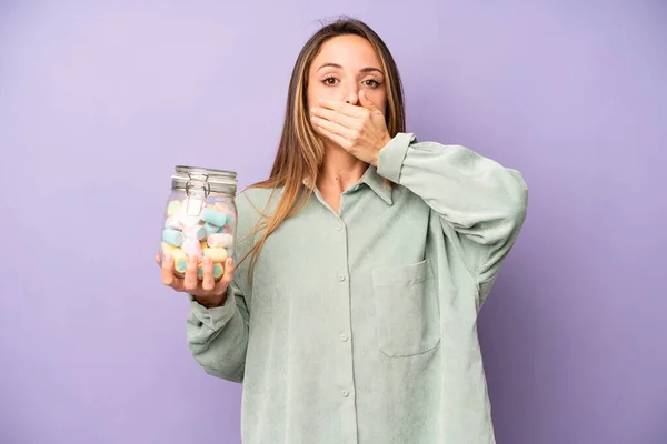 Pretty Caucasian Woman Covering Mouth Hands Shocked Candies Bottle Concept — Stock Photo, Image