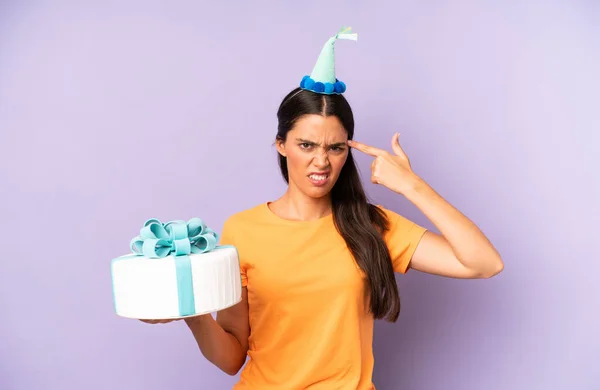 Pretty Hispanic Woman Feeling Confused Puzzled Showing You Insane Birthday — Stock Photo, Image