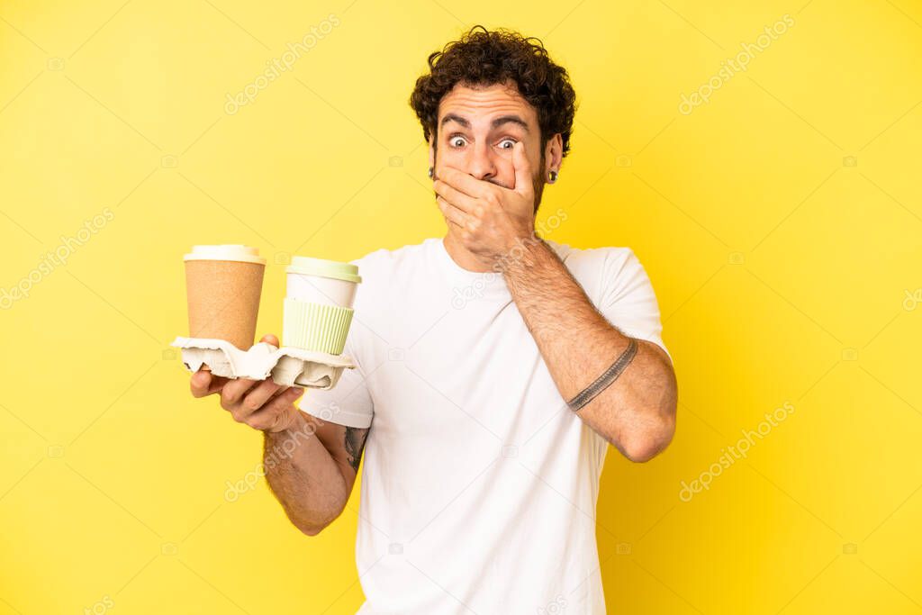 crazy bearded man covering mouth with hands with a shocked. take away coffee concept