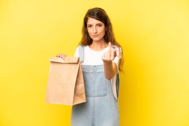 pretty caucasian woman feeling angry, annoyed, rebellious and aggressive. take away concept