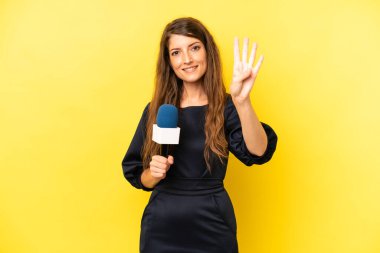 pretty caucasian woman smiling and looking friendly, showing number four. tv presenter concept
