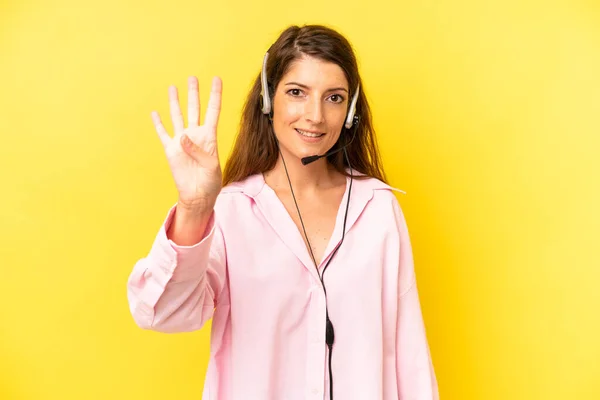 Pretty Caucasian Woman Smiling Looking Friendly Showing Number Four Telemarketing — Stock Photo, Image