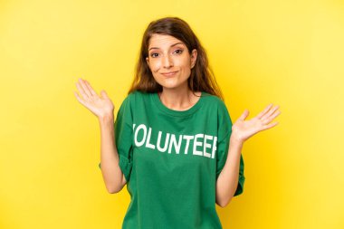 pretty caucasian woman feeling puzzled and confused and doubting. enviromental volunteer concept