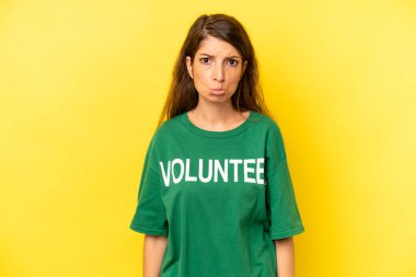 pretty caucasian woman feeling sad and whiney with an unhappy look and crying. enviromental volunteer concept