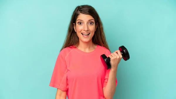 Pretty Caucasian Woman Looking Happy Pleasantly Surprised Fitness Dumbbell Concept — Foto de Stock