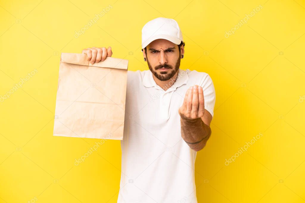 crazy bearded man making capice or money gesture, telling you to pay. take away concept delivering