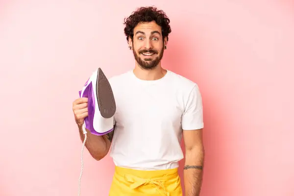 Crazy Bearded Man Looking Happy Pleasantly Surprised Housekeeper Iron Clothes — Stock Photo, Image