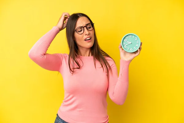 Hispanic Young Adult Woman Smiling Happily Daydreaming Doubting Alarm Clock — Stock Photo, Image