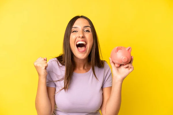 Hispanic Young Adult Woman Feeling Shocked Laughing Celebrating Success Piggy — Stock Photo, Image