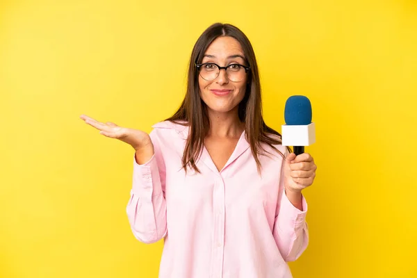 Hispanic Young Adult Woman Feeling Puzzled Confused Doubting Interviewer Microphone — Stock Photo, Image
