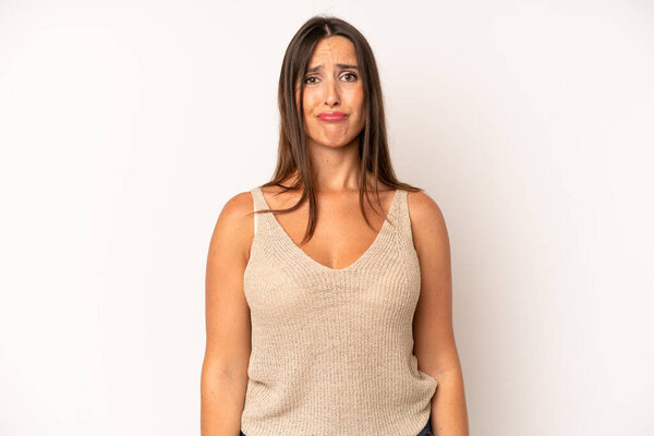 hispanic pretty woman feeling sad and stressed, upset because of a bad surprise, with a negative, anxious look