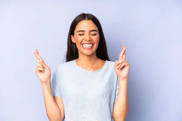 Hispanic Pretty Woman Smiling Anxiously Crossing Both Fingers Feeling Worried — Stock Photo, Image
