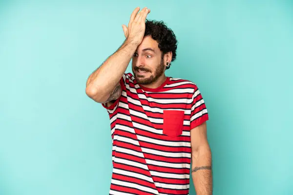 Young Bearded Man Raising Palm Forehead Thinking Oops Making Stupid - Stock-foto