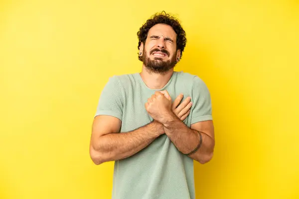 Young Bearded Man Looking Sad Hurt Heartbroken Holding Both Hands — Stock Photo, Image