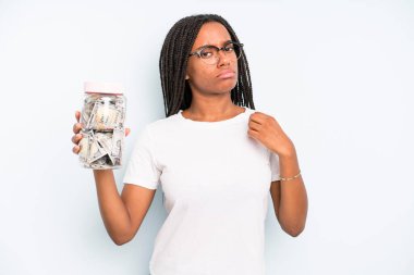 black pretty woman looking arrogant, successful, positive and proud. savings concept