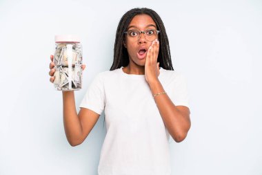 black pretty woman feeling shocked and scared. savings concept