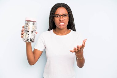 black pretty woman looking angry, annoyed and frustrated. savings concept