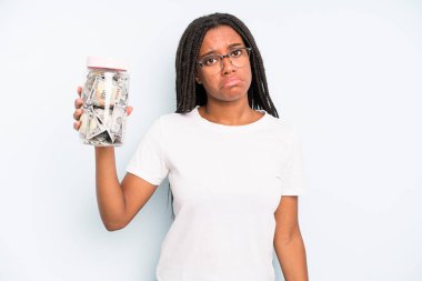 black pretty woman feeling sad and whiney with an unhappy look and crying. savings concept
