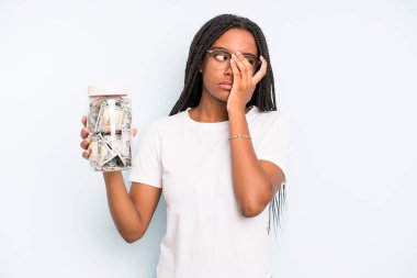 black pretty woman feeling bored, frustrated and sleepy after a tiresome. savings concept