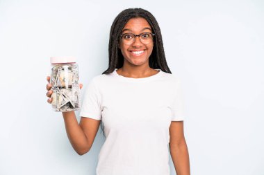 black pretty woman looking happy and pleasantly surprised. savings concept