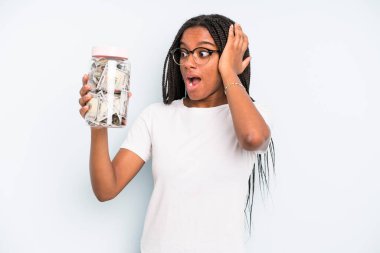 black pretty woman feeling happy, excited and surprised. savings concept