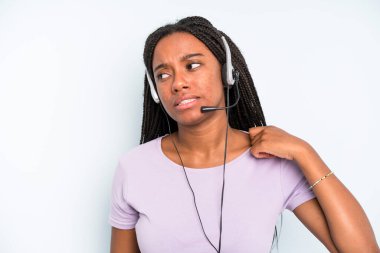 black pretty woman feeling stressed, anxious, tired and frustrated. telemarketer concept