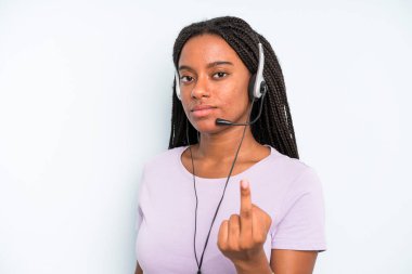 black pretty woman feeling angry, annoyed, rebellious and aggressive. telemarketer concept