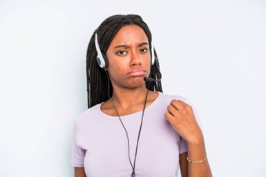 black pretty woman looking arrogant, successful, positive and proud. telemarketer concept