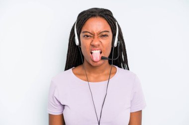 black pretty woman feeling disgusted and irritated and tongue out. telemarketer concept