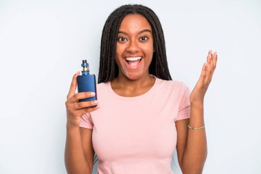 black pretty woman feeling happy and astonished at something unbelievable. smoker vaper concept